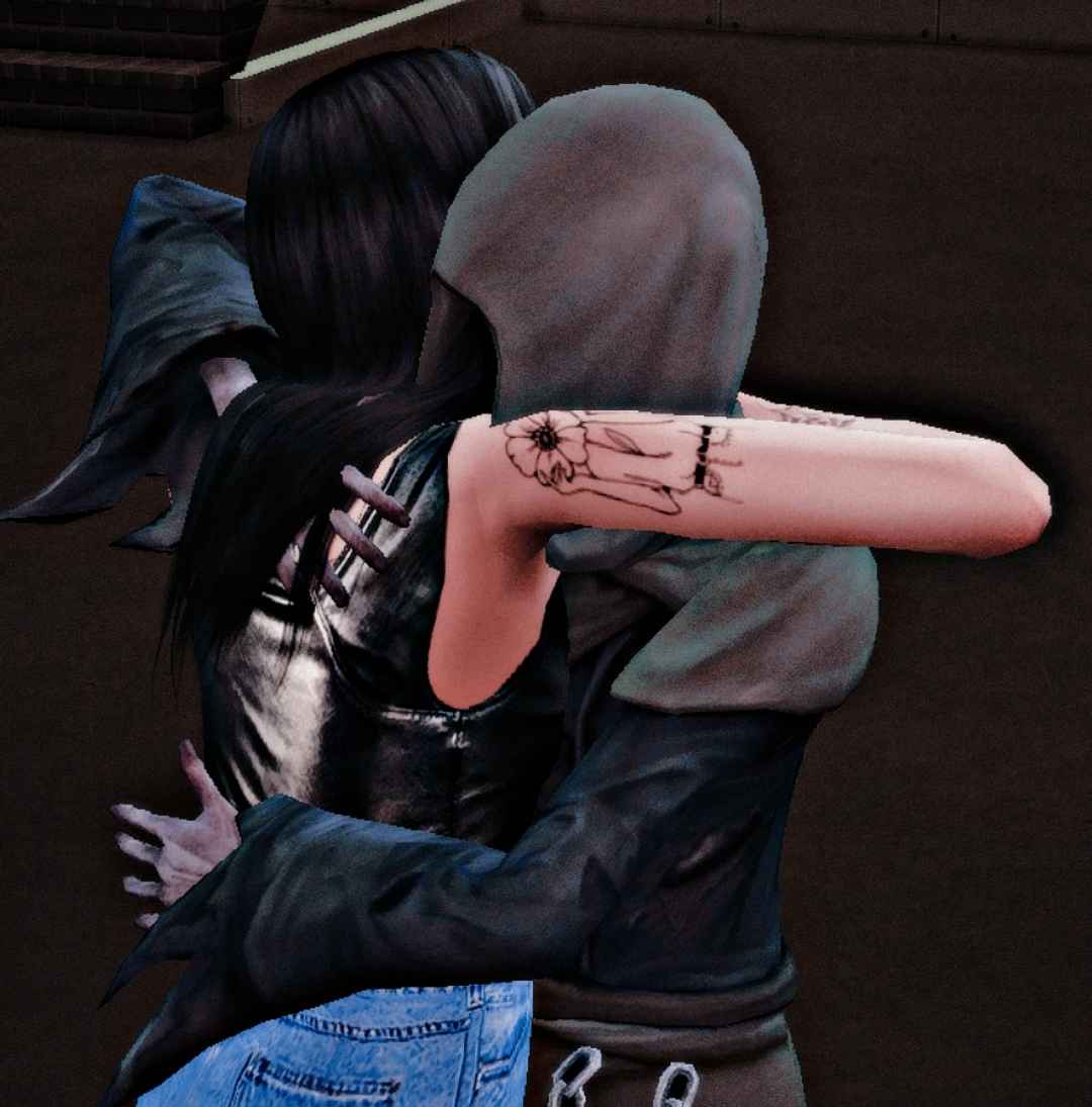 A sim of the author hugging the sim of the grim reaper